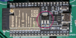 Close-up of ESP32 modulator with power regulator circled
